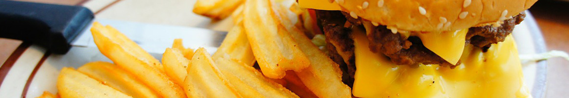 Eating American (New) Belgian Burger at Trappe Door restaurant in Greenville, SC.